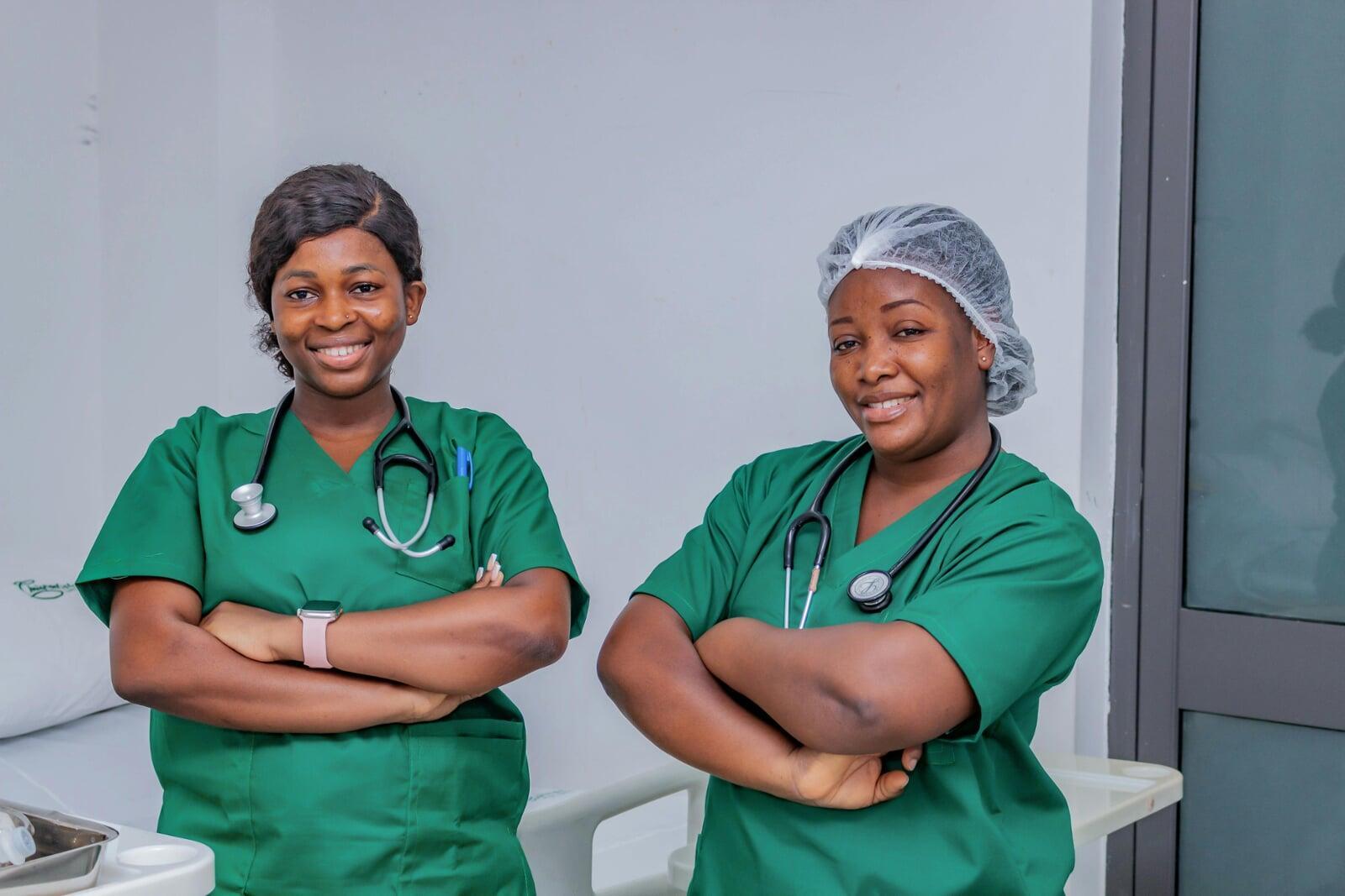 Two female nurses dressed in scrubs